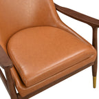 Fauteuil d'appoint en similicuir marron avec pieds fuselés