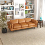 Canapé en cuir couleur sable pour salon, style Mid-century modern
