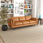 Canapé en cuir couleur sable pour salon, style Mid-century modern