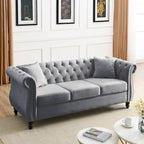 Canapé Chesterfield 3 places capitonné avec accoudoirs roulés et clous décoratifs