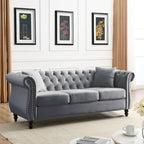 Canapé Chesterfield 3 places capitonné avec accoudoirs roulés et clous décoratifs